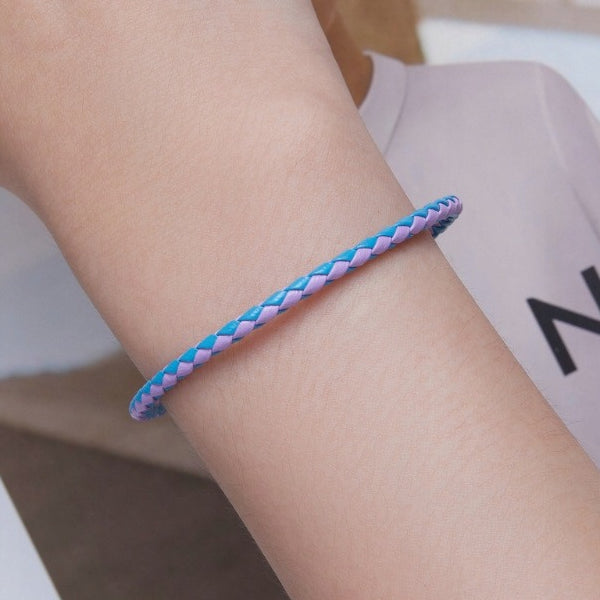 Blauwe en roze leren armband