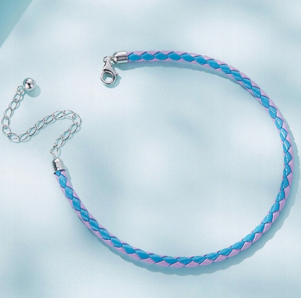 Blauwe en roze leren armband